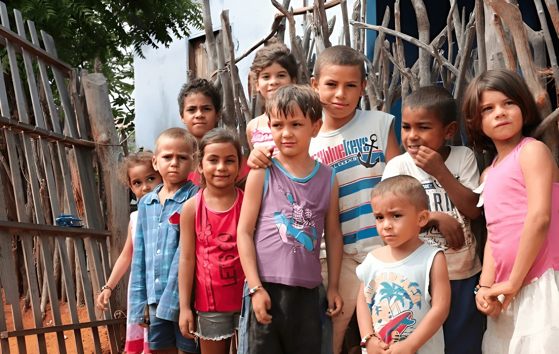 Group of children smiling together.